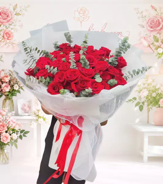 Bó hoa hồng đỏ gói lưới trắng