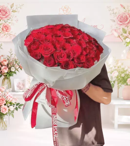 Bó hoa hồng đỏ gói trắng dải ruy băng