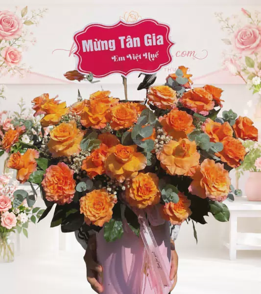 Giỏ hoa hồng cam mừng tân gia