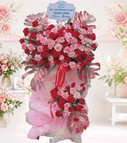 Kệ hoa khai trương đỏ hồng kèm bảng chúc mừng