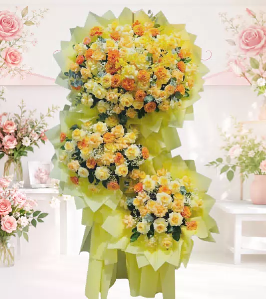 Kệ hoa khai trương vàng cam 3 tầng bọc giấy vàng chanh