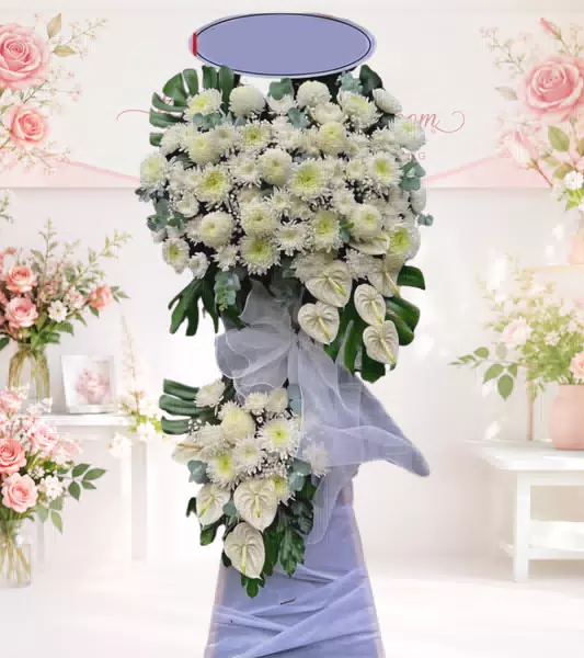 Kệ hoa tang lễ cúc trắng hoa hồng môn trắng hai tầng