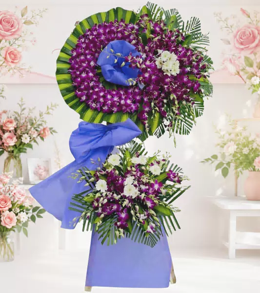 Kệ hoa tang lễ lan tím cẩm cúc trắng nơ xanh dương