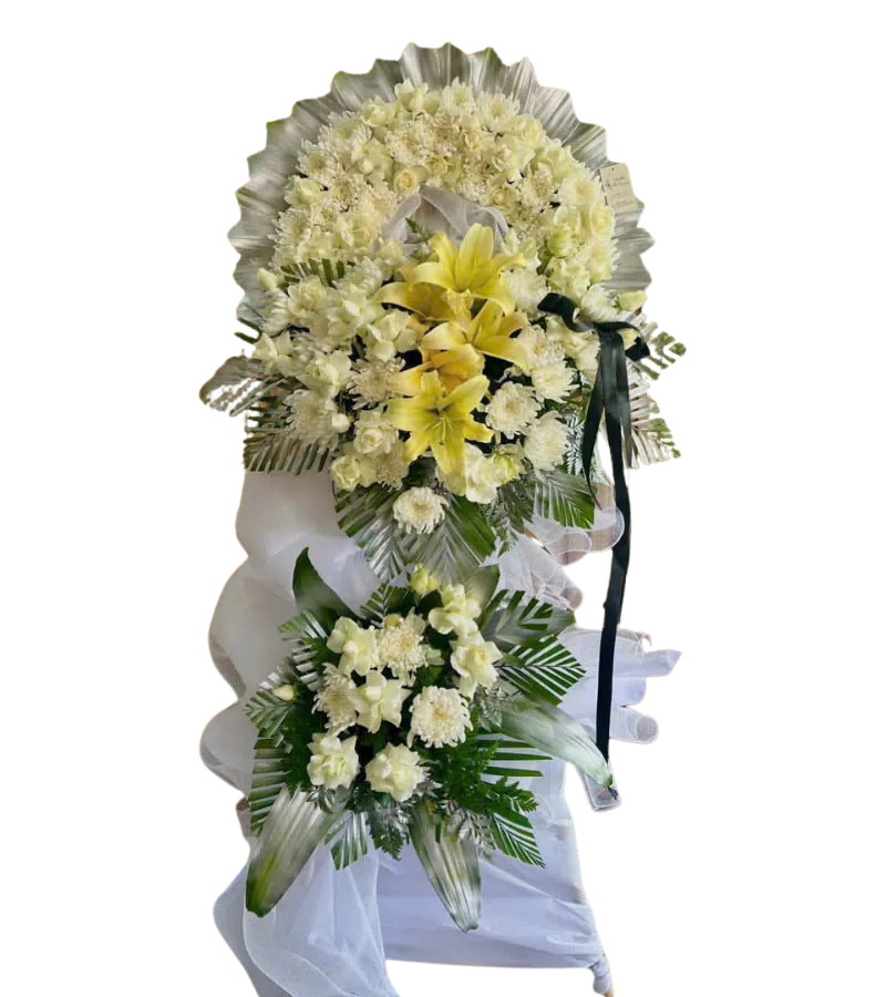 Kệ hoa tang lễ lily vàng cúc trắng nơ đen