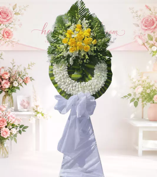Vòng hoa chia buồn hồng vàng trắng