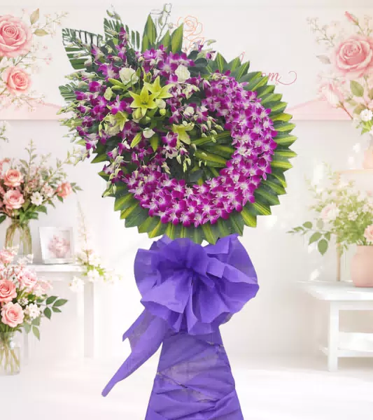 Vòng hoa chia buồn lan tím đậm nơ tím