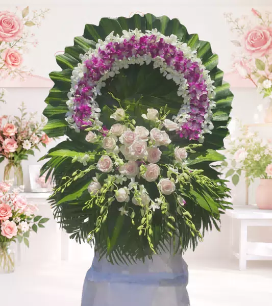 Vòng hoa chia buồn lan tím hồng phấn