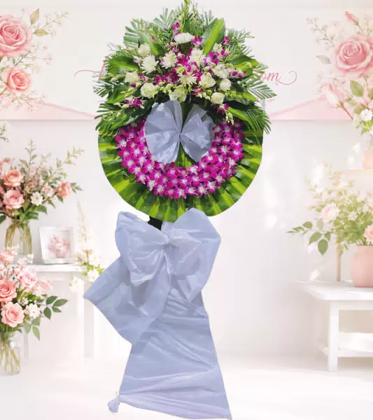 Vòng hoa chia buồn lan tím trắng