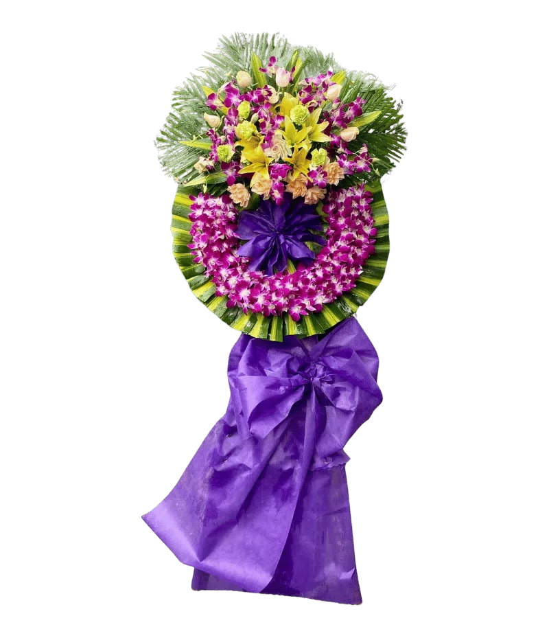 Vòng hoa chia buồn ly vàng cẩm chướng nơ tím