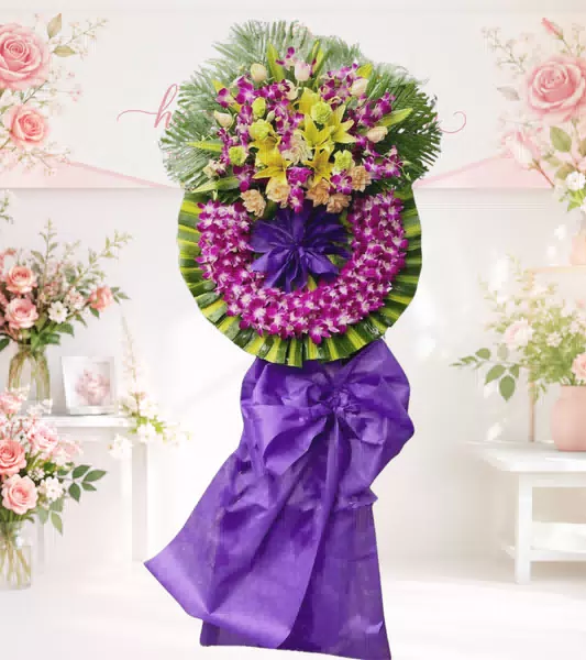 Vòng hoa chia buồn ly vàng cẩm chướng nơ tím