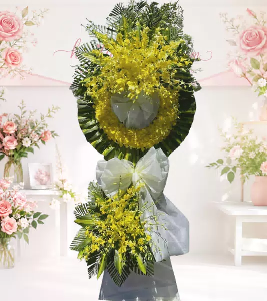 Vòng hoa chia buồn tone vàng lan vàng nơ trắng